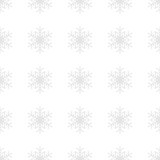 Snowflakes background in light gray colors