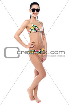 Sensual bikini woman wearing sunglasses