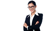 Businesswoman posing with arms folded