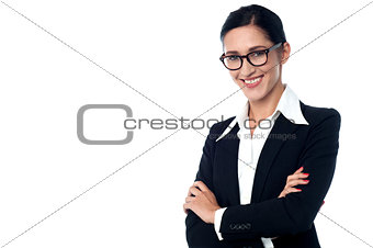 Businesswoman posing with arms folded