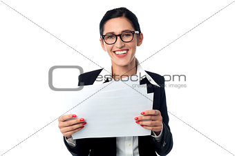 Corporate woman holding business reports