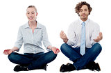 Business people practicing meditation