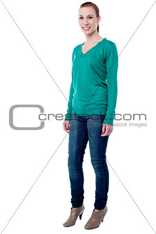 Cheerful young girl posing in trendy style