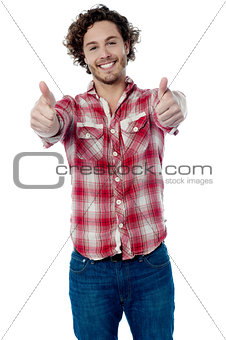Guy showing double thumbs up