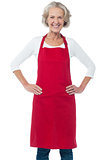 Cheerful aged confident female chef