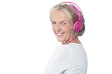 Aged woman enjoying today's music