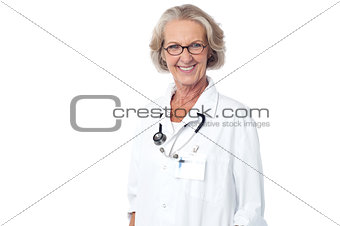 Senior medical professional posing