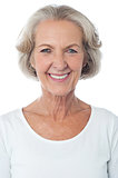 Casual aged woman posing for camera