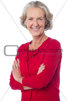Confident senior smiling woman posing