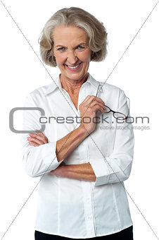 Smiling aged woman looking at you