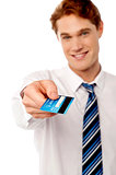 Corporate man offering you credit card