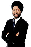 Indian businessman posing confidently