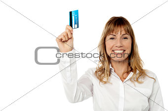 Businesswoman displaying cash card