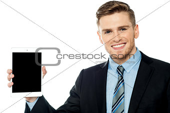 Salesman displaying new tablet device