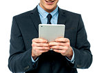 Businessman browsing on tablet pc