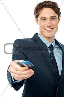 Corporate man offering you credit card