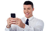 Corporate guy using mobile phone
