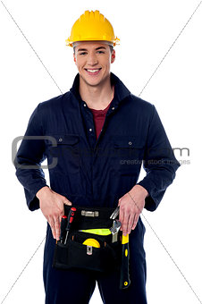 Happy young male construction worker