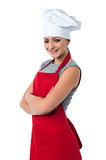 Confident young female cook