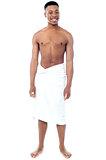 Young man wearing towel