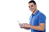 Young guy using tablet pc