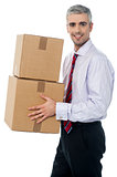 Corporate man with a cardboard box in hand
