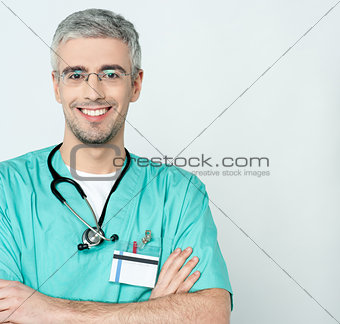 Smiling middle aged physician