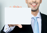 Man hand showing business card