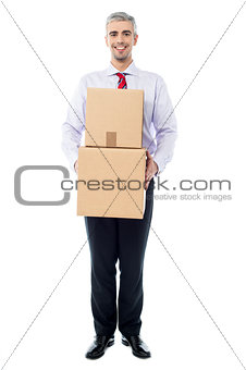Handsome male with with stack of boxes