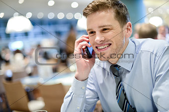 Young executive talking on the phone