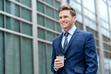 Businessman with cup of a coffee