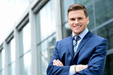 Young businessman smiling in a office outdoor