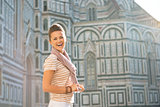 Portrait of happy young woman in front of cattedrale di santa ma