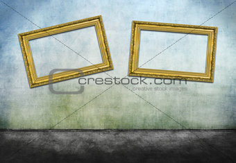 Two crooked golden frames 