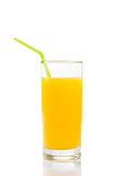 full glass of orange juice with straw