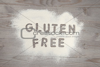 Word gluten free written in white flour 