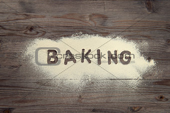 Word baking written in white flour