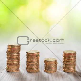 Stack coins with nature background