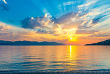 beautiful scenic sunrise over the a quiet Aegean Sea