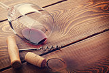 Wine glass, cork and corkscrew