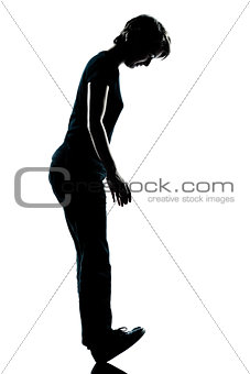 one young teenager boy or gir standing balancing on heels silhou