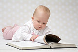 Baby with the book