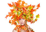 Beautiful young woman wrapped in leafs