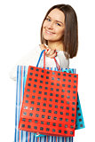 Portrait of young happy smiling woman with shopping bags, isolated over white background