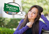 Young Woman with Thought Bubble of Success Green Road Sign 