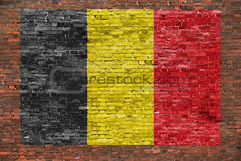 Flag of Belgium on aged brick wall