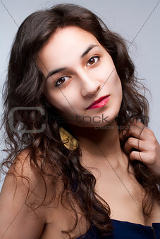 Portrait of a Young Beautiful Woman with Long Brown Hair