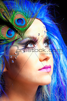 Woman in Blue Wig and Peacock Feathers