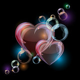 Romantic background with colorful bubble hearts shapes on black background.