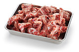 pork spine on butcher tray